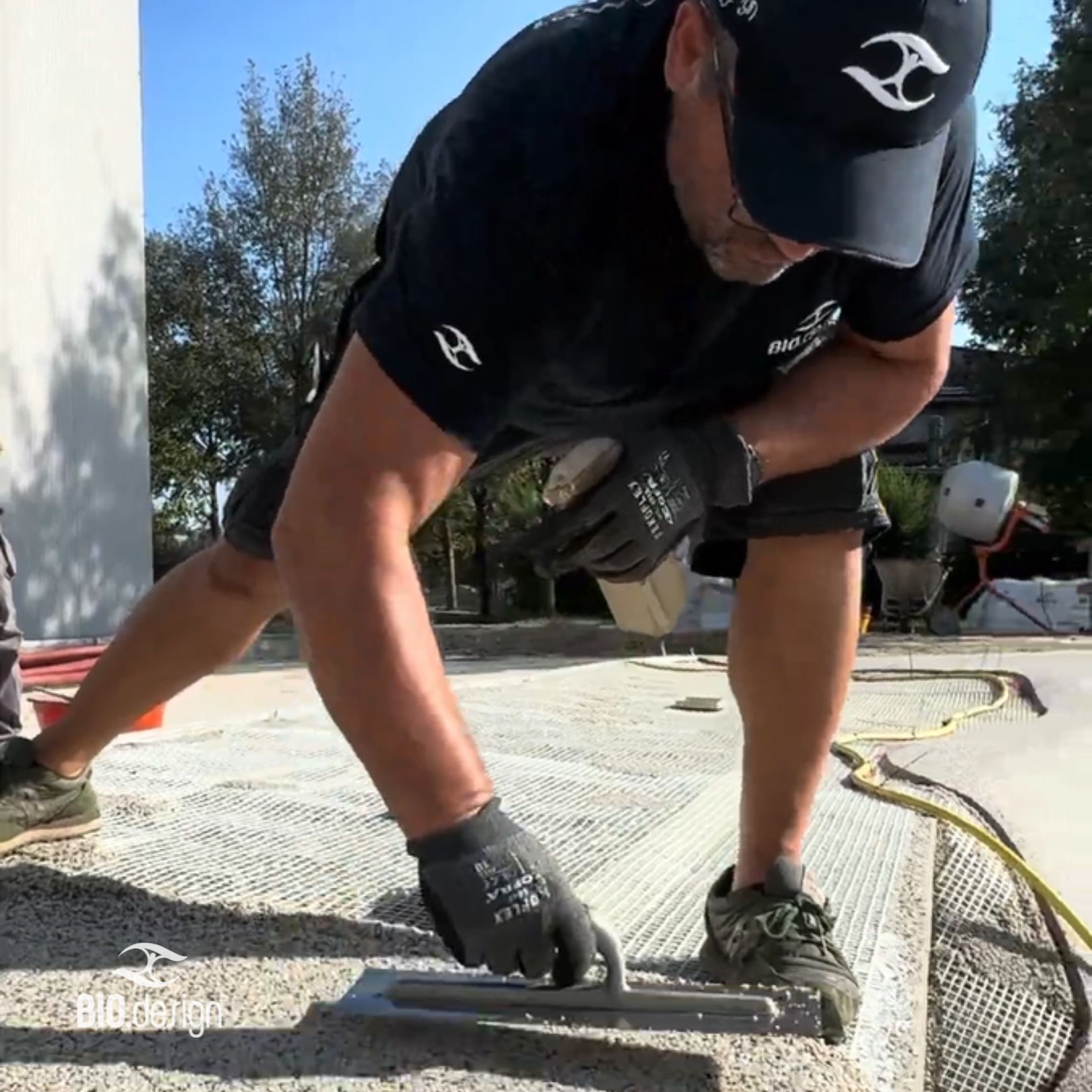 Infinity Beach installation team applying structural coating